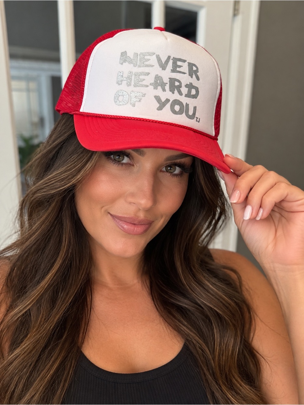 Red and White Trucker Hat with 'Never Heard of You' Slogan